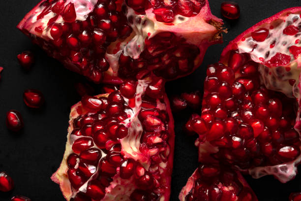 istock Close-up of ripe pomegranate seeds. 1448345400