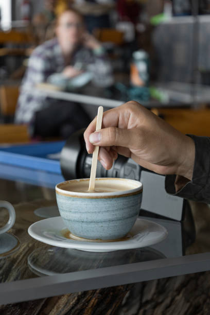 istock porcelain cup with coffee, served table with light blue decorated crockery, hot drink in restaurant 1448345650