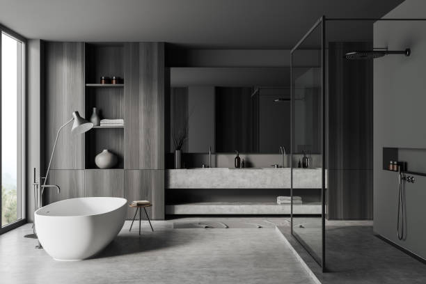 istock Grey bathroom interior with sink and tub, douche and panoramic window 1448346827