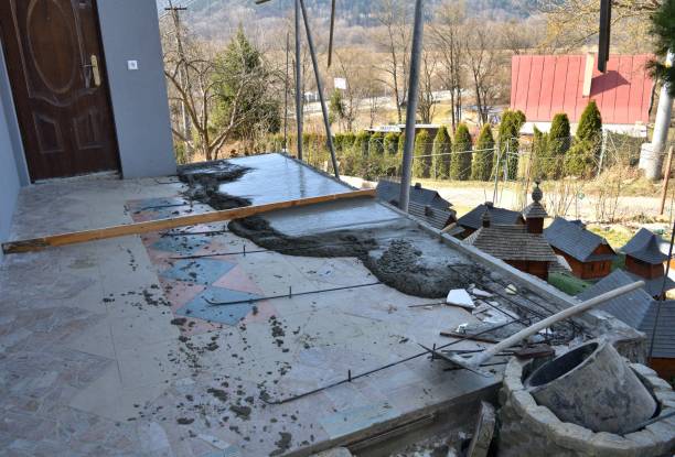 istock Construction of the floor at the house by hand using a wheelbarrow 1448346883