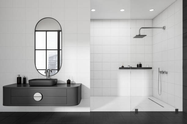 istock Side view on dark bathroom interior with shower, white walls 1448347170