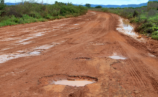 umburanas, bahia, brazil - november 30, 2022: view of a dirt road without asphalt paving in the city of Uburanas.