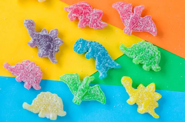 Photo of Dinosaurs colorful jelly bonn, color background