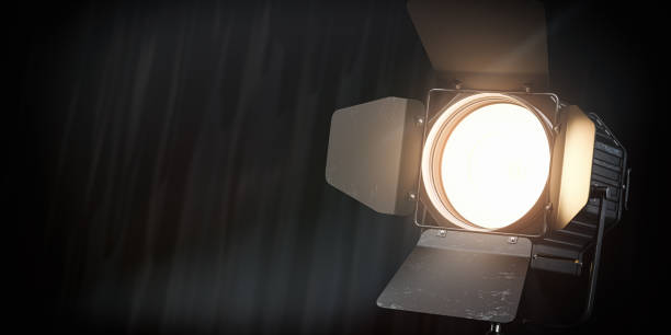 istock Stage or studio spotlight on black curtain background. Lighting equipment for Studio photography or videography. 1448349057