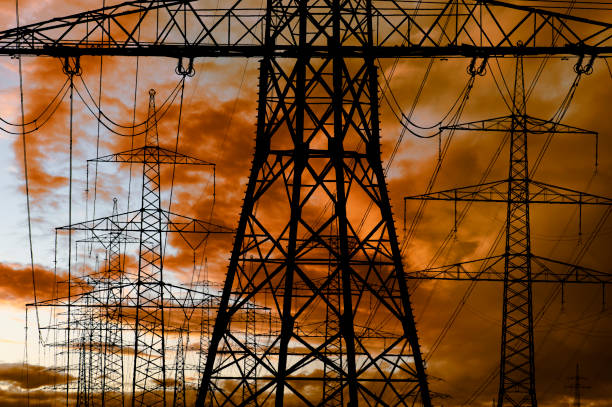istock pylons and high voltage cable for electricity and energy 1448351931