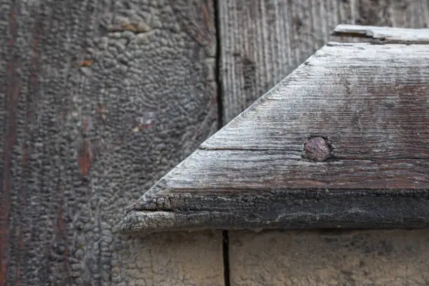 Old weathered wooden beam with distinctive grain - texture, pattern