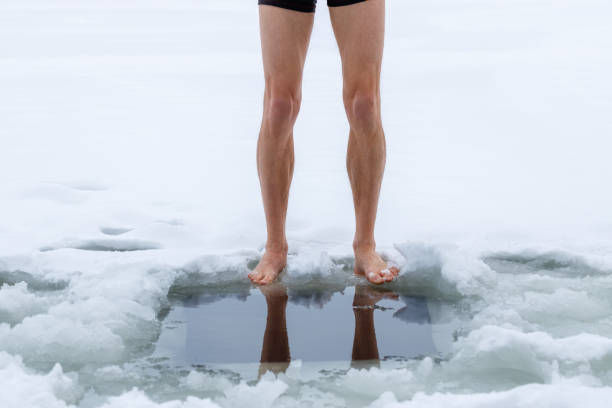 istock Winter hardening in cold water. 1448352105