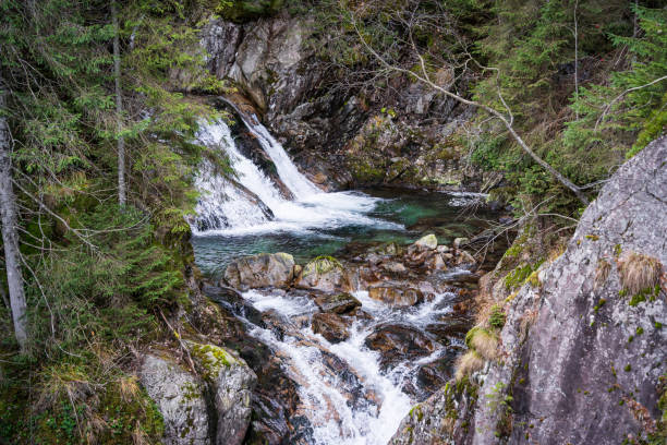 Mickiewicz waterfall near the road to Morskie Oko lake. Zakopane, Tatra Mountains National park, Poland.