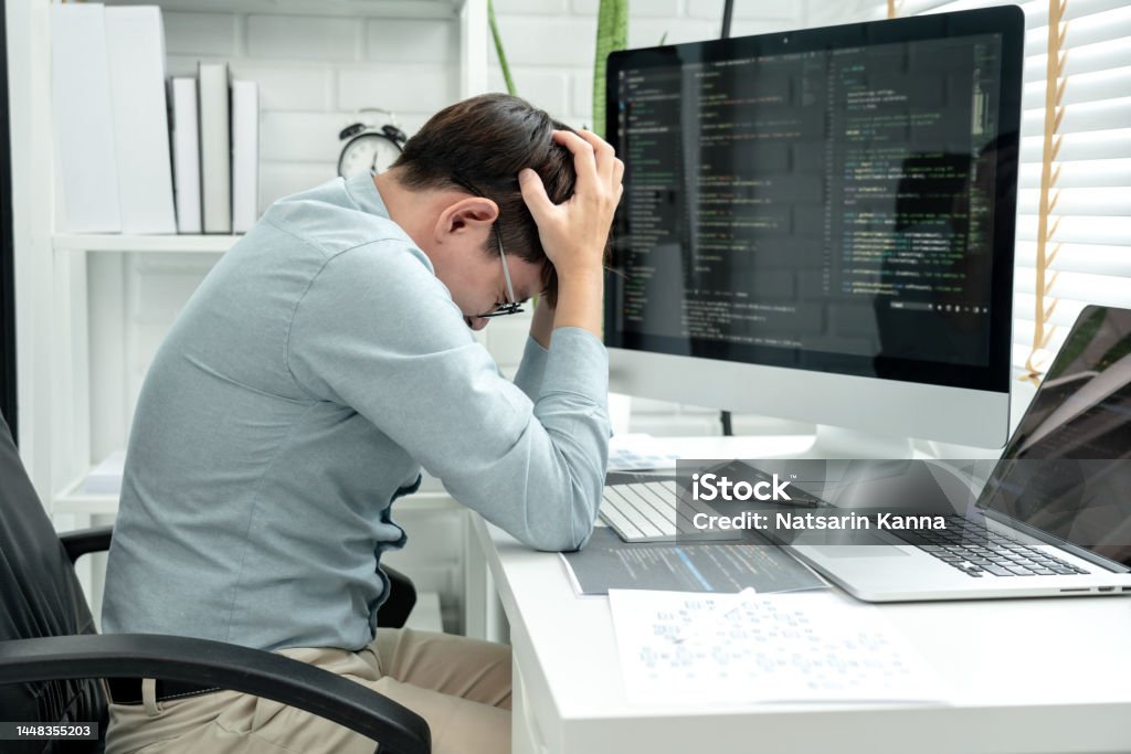 Male Programmer Feeling Headache And Stress During Checking Program ...