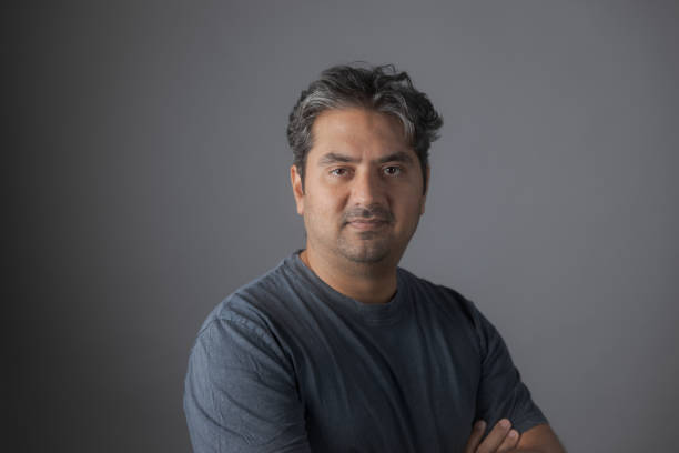 istock Portrait of Indian man looking at camera smiling 1448358454