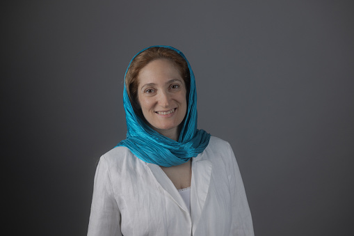 Iranian female portrait looking at camera smiling