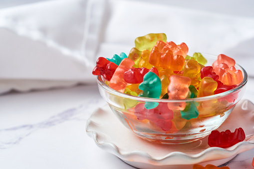 Assortment of colored gummy bears in a bowl