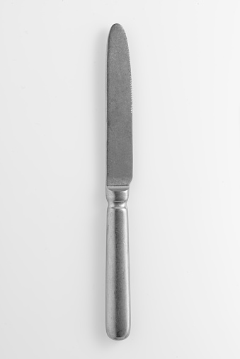 Silver knife isolated on white background.