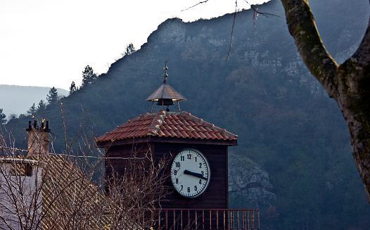Submerged bell Tower of Curon Venosta or Graun im Vinschgau on Lake Reschen landscape view, South Tyrol region Italy