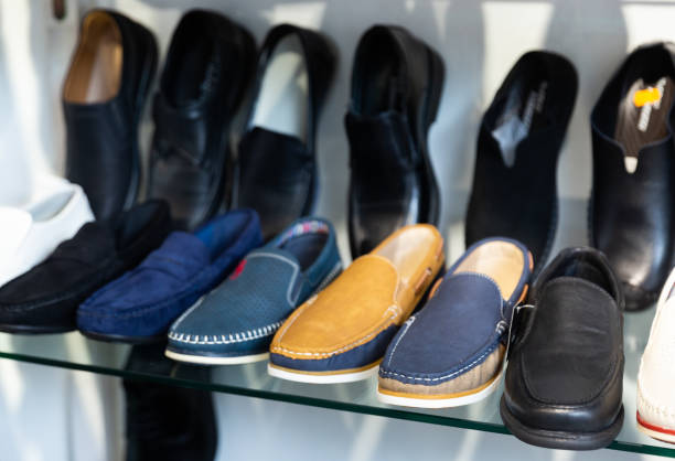istock Showcase with casual shoes in a  store 1448362935