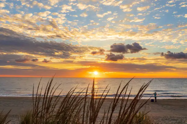 An idyllic sunrise at Rehoboth beach in Delaware.