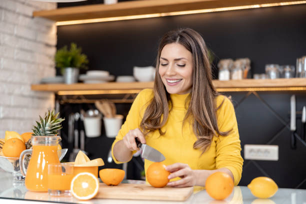 istock Home made orange juice from fresh oranges 1448365178