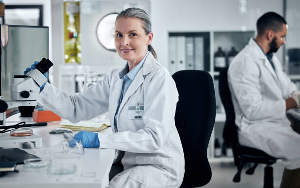 istock Science, lab and research for innovation, analysis and cure development with woman scientist working in a medical labratory together. Healthcare, biotechnology and discovery in medicine with team 1448367155