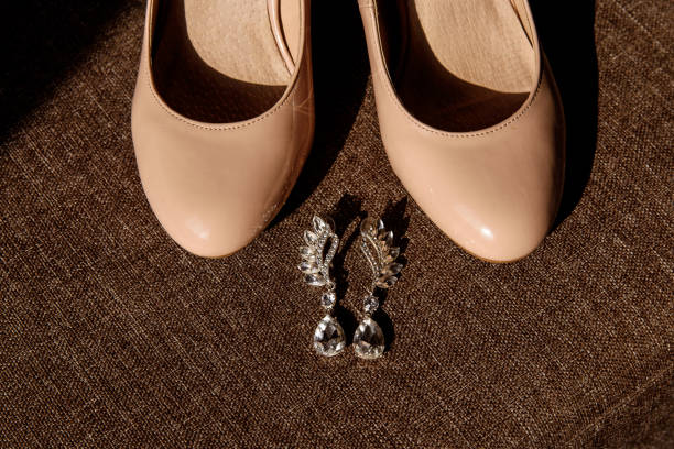 istock Wedding accessories of the bride in brown background 1448371769