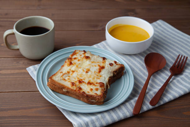 istock breakfast croque monsieur and hot coffee isolated on table 1448374429