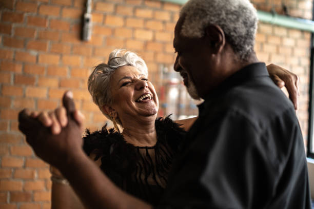 istock Senior couple dancing waltz in dance hall 1448374555