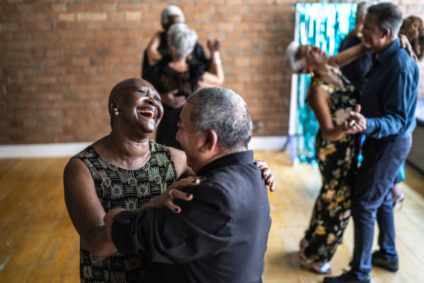 istock Amputee mature man dancing with his wife in dance hall 1448374670