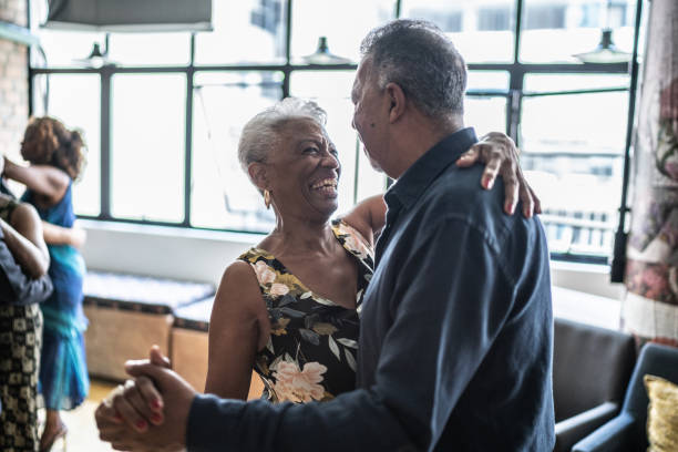istock Senior couple dancing waltz in dance hall 1448374702