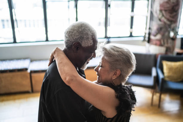 istock Senior couple dancing waltz in dance hall 1448374719