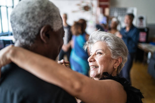 istock Senior couple dancing waltz in dance hall 1448374727