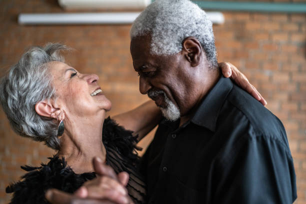 istock Senior couple dancing waltz in dance hall 1448376336