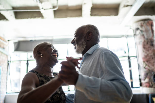 istock Senior couple dancing waltz in dance hall 1448376354