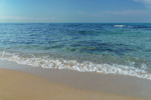 summer vacation background at the sea. clear water and sandy beach. relax and recreation season