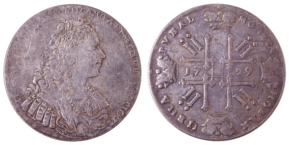 A silver coin of the 18th century Russia with a nominal value of one ruble 1729