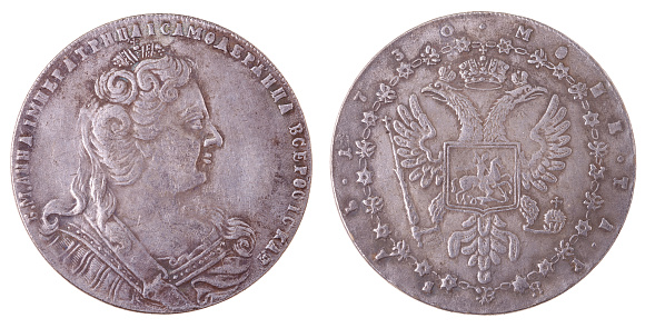 A silver coin of the 18th century Russia with a nominal value of one ruble 1730