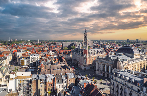 Cityscape of Lille (Hauts-de-france, Flanders, France) at sunset: Aerial skyline view of the historical Grand Place du Général-de-Gaulle, old town main square.