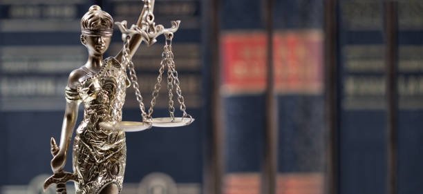 istock justice statue with law books 1448383233