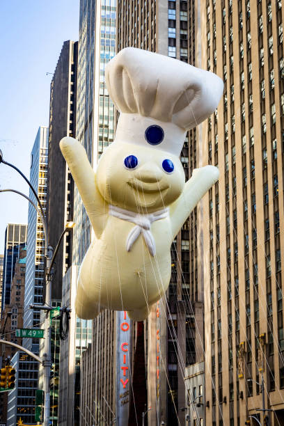 New York, USA - November 24, 2022: Annual Thanksgiving Macys parade with inflated Pillsbury Doughboy character