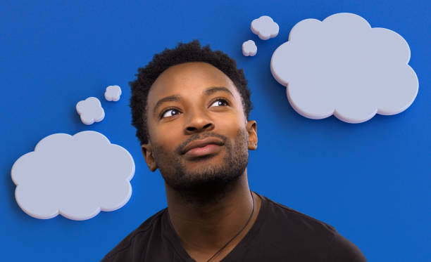 visionary man thinking imagination concept dream white clouds on blue background inspiration man thinking two thought clouds idea decision choice solution white bubble on blue background day dreaming stock pictures, royalty-free photos & images