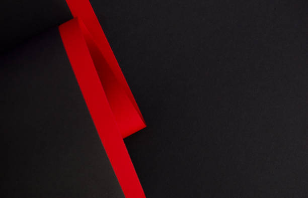 istock Abstract red and black curved colored paper background, copy space 1448385981