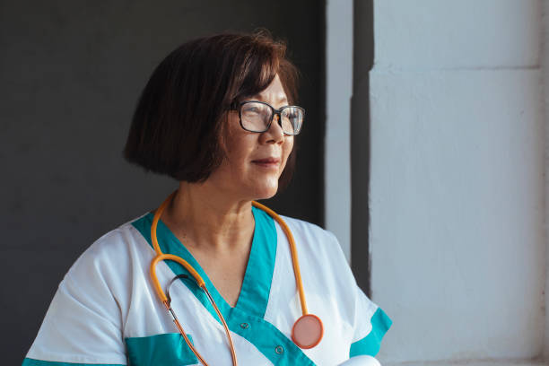 istock Thai female doctor 1448386846