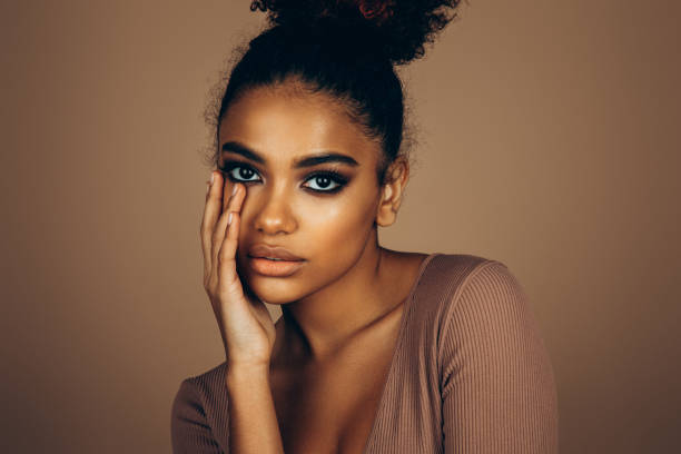 istock Beautiful afro woman with perfect make-up 1448387304