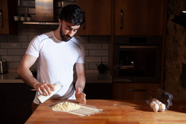istock preparing homemade pasta in the kitchen at home 1448388148