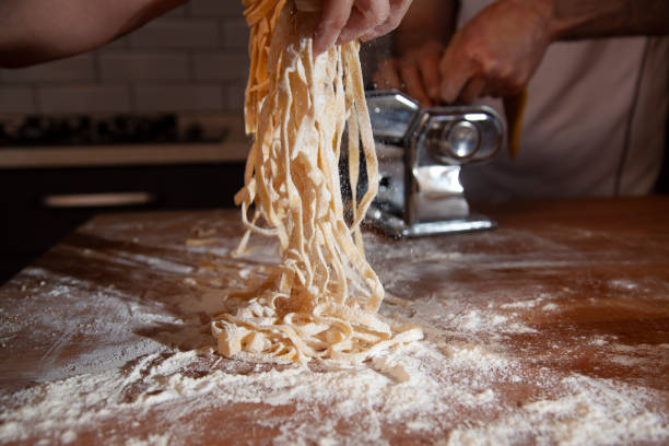 istock preparing homemade pasta in the kitchen at home 1448389560