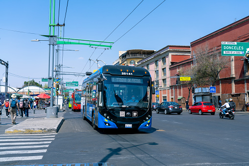 Mexico City, Mexico - February 18 2022: A Trolley Bus drives down the street in Mexico City