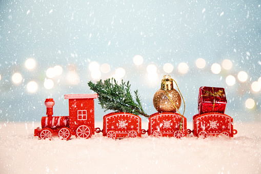 Red toy train with ornaments