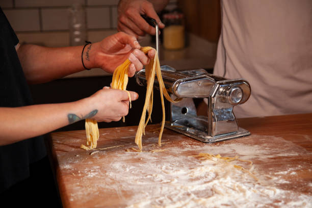 istock preparing homemade pasta in the kitchen at home 1448391264