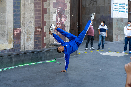 Mexico City Mexico - February 18 2022: Performer Break dancing in the central district of Mexico City