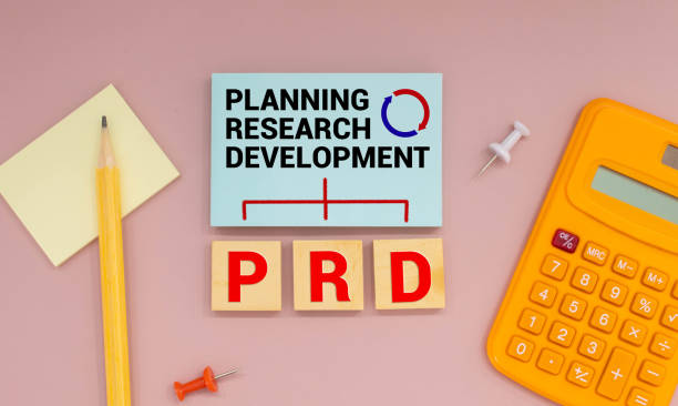 istock Concept image of Business Acronym PRD as Planning Research and Development written over road marking yellow painted line 1448393762