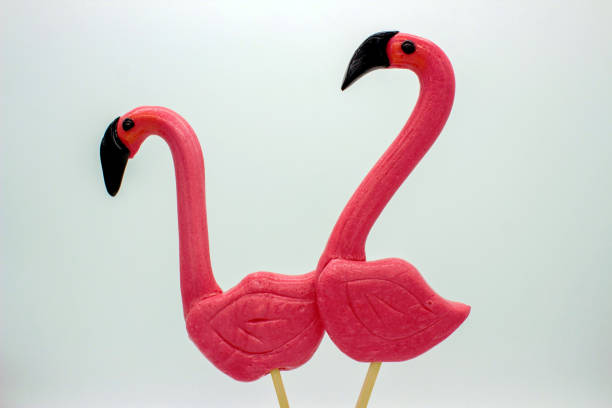 istock Two flamingo-shaped lollipop candies 1448396103
