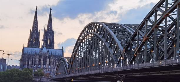 istock railway bridge and cologne cathedral in germany 1448396917